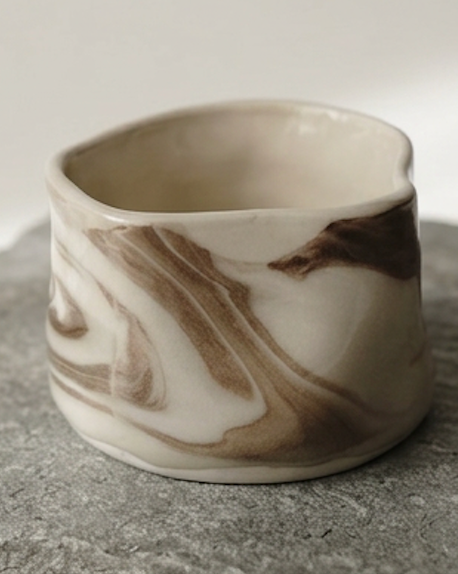 Irregular hand-shaped porcelain cup with chocolate brown and cream marbling Ceramics By Marla.