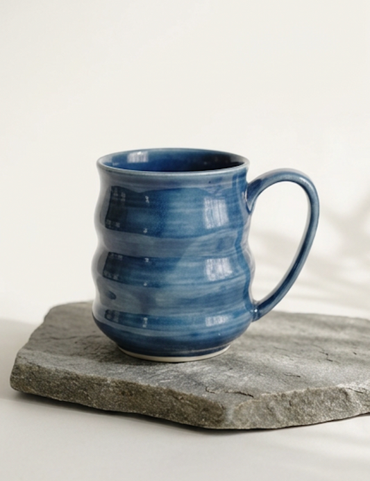 Ridged stoneware mug with a brushed denim blue glaze Ceramics By Marla.
