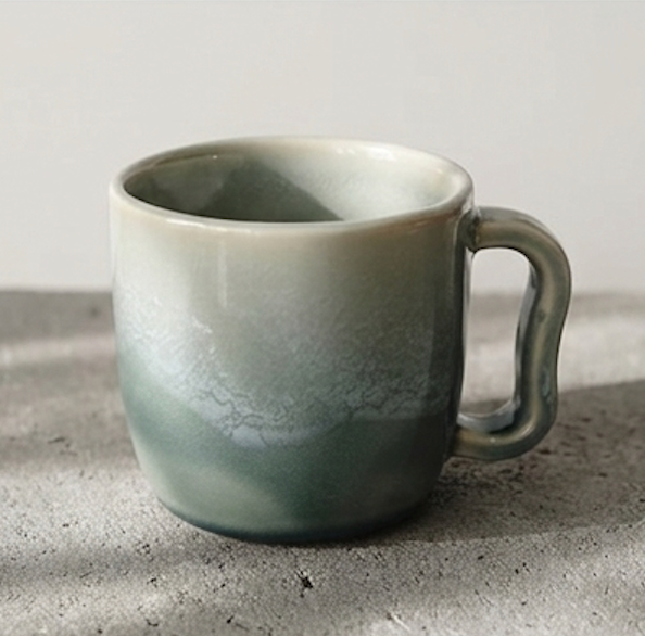 White and blue ombre glazed porcelain mug with a curved handle Ceramics By Marla